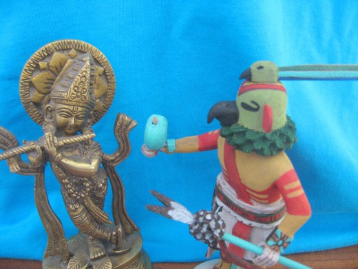 Kyashu Katsina the Hopi Parrot dances with Krishna the God of Love while he is playing his flute.