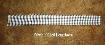 strip of material folded lengthwise