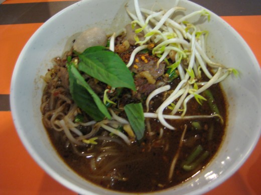 A bowl of beef and egg noodle 