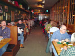 In the front of the dining area, you can see the second to last booth. That's where the "Murphy's Law" poster is hung and it is where I tasted my first pint of Guinness.