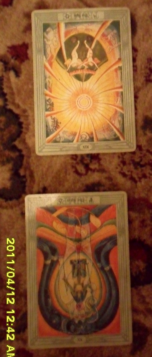 The final two cards.  The lower one indicates how my hopes and fears eill bear on the question.  The card above that is the final one representing the likely outcome.  NB  Card are reversed, which either reverses or reduces their signification. 