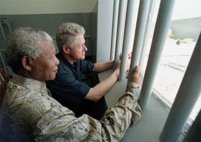 Mandela soon developed an international reputation as an uncompromising, no-nonsense president, as Bill Clinton found out during his visit to South Africa in 1999. Clinton was taken to Robben Island and, as this picture shows, he was taken into the c