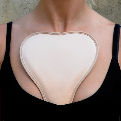 When a woman sleeps on her side, the body's natural weight distribution causes her skin to fold between her breasts. As skin loses resiliency with age, these folds become unsightly wrinkles and permanent creases on her chest. Stop the wrinkles!
