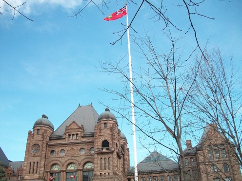 The Legislative Building of the Parliament of Ontario, with the Provincial flag of Ontario
