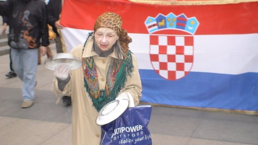 OLD LADY LEADING THE PROTESTERS IN THE FRONT OF CROATIAN FLAG : THIS WOMAN WOULD STARVE WITHOUT OF SUPPORT OF HER SISTER, altough very old she is active in all protests. 
