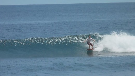 Victor Dykman - a Dutch wavesurfer was wave surfing at Amban beach of Manokwari city - the Repulic of Indonesia. Photographer: Anne B