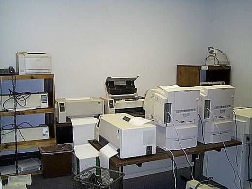 Extreme collections of computer printers process coupons day and night. 