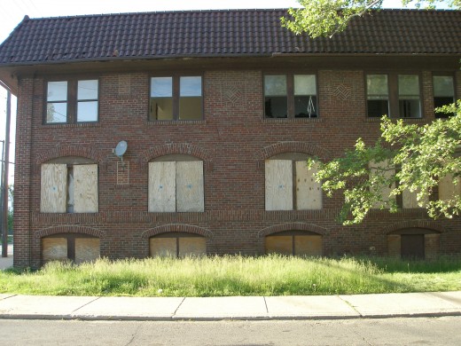 Many childhood friends and classmates used to live in this building at the corner of my street.