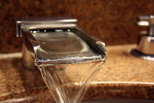 Faucet artwork with granite counter. (CCL 1)