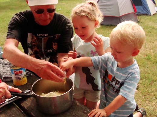 Making a pineapple upside down cake while camping.