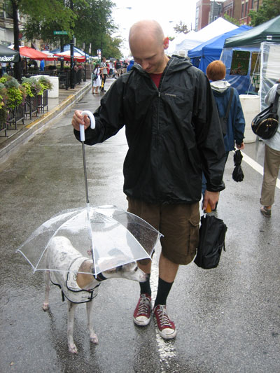 I liked this picture the best. The guy doesn't seem to mind getting wet as long as his poochie stays dry!