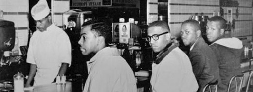 Greensboro Lunch Counter 1960 Day 2: Joseph A. McNeil and Franklin E. McCain are joined by William Smith and Clarence Henderson at the Woolworth lunch counter in Greensboro, North Carolina. 