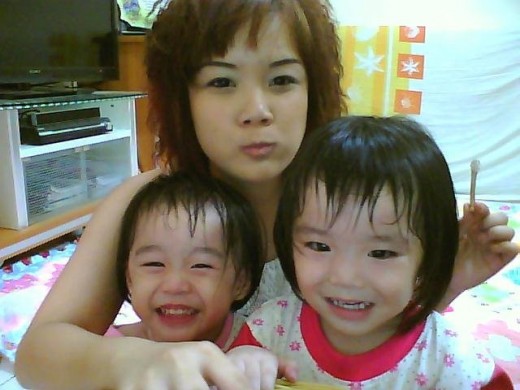 Chew it sis, not too obvious, lest the kids will try to get it (Hungry and babysitting).