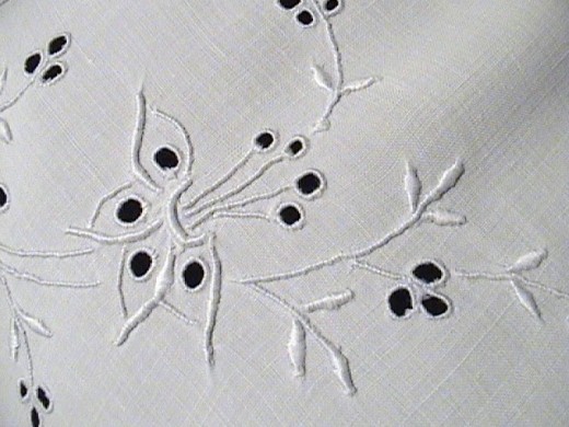 Raised padded satin embroidery from ironing wrong side when tablecloth very damp