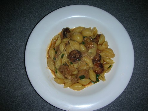 Pasta shells with sausage and clams
