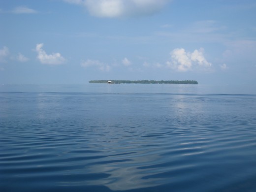 Another island in Karimunjawa. We call it a floating island for the  water around it as blue as the sky so that makes it like floating.