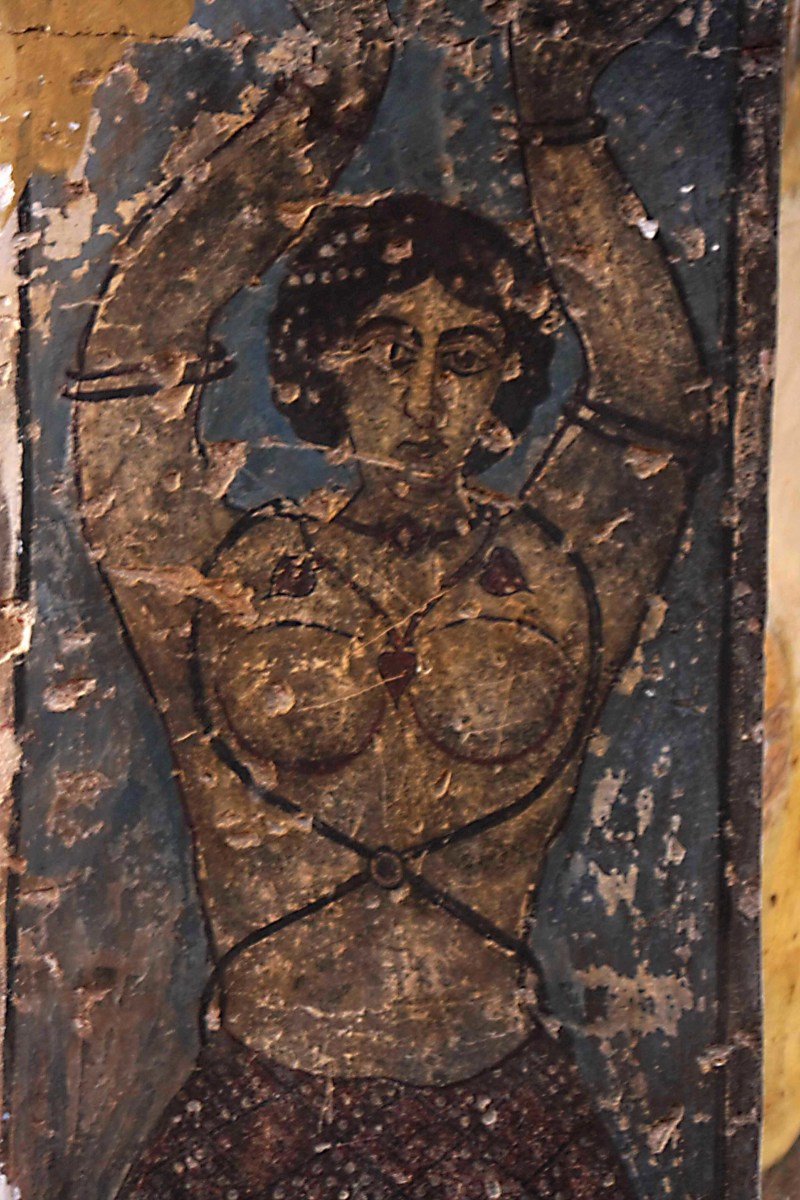 Frescoes at Qasr Amri are unusual in their depiction of human figures. This image is of a female figure, probably a dancing girl. Such revealing images of human beings as these would be strictly forbidden in later Islamic art.