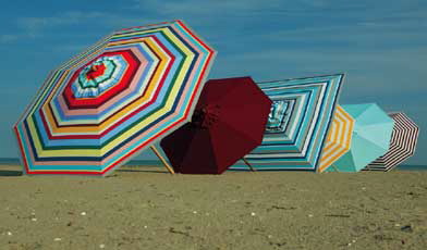 Beach umbrellas together create a work of art. Image from Janus et Cie