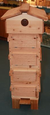 I don't have a Warre hive, but I'd like one.  They have some advantages of both top bar hives and Langstroth hives.  Wouldn't you like to live in a house this nice?