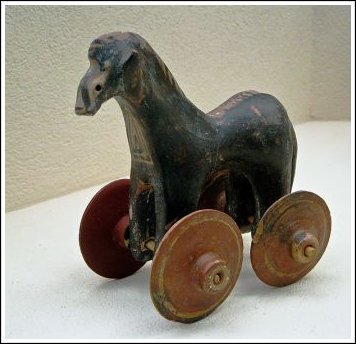 Ancient Greek child's toy from a tomb dating 950-900 BC