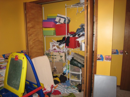 My son's closet.  It's like our giant junk drawer.  I was ready to change that.  