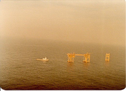 Sister rigs off South Texas coast. That's a long walkway built between the first two.