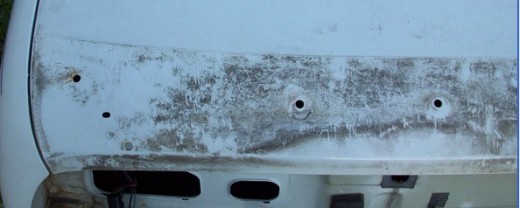 The blackish area is the outline of a 94 spoiler off of the car.