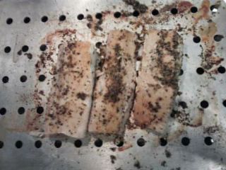 evenly place spices across fish on broiling pan