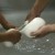 Two workers are needed as one holds the matured 8 lb. chunk and another pinches off fist-sized spheres. Italian for "pinch" is "mozza". Get it? Two workers are needed as one holds the matured 8 lb. chunk and another pinches off fist-sized spheres. Italian for "pinch" is "mozza". Get it?