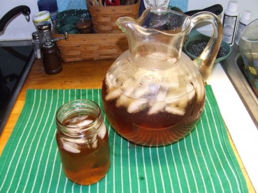 Fill a serving pitcher with ice, pour mint water and Sun Tea over the ice and serve.