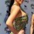 Here's Kim in a beautiful green one armed print dress. Here's Kim in a beautiful green one armed print dress.