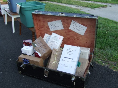Items that did not sell last year were put into Surprise Boxes for this years sale. Children love these surprise boxes.