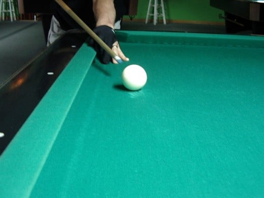 Photo 4: A player about to break on the right hand side of the table, from behind the head-line.