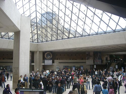 Crowds waiting to enter the Louvre galleries.