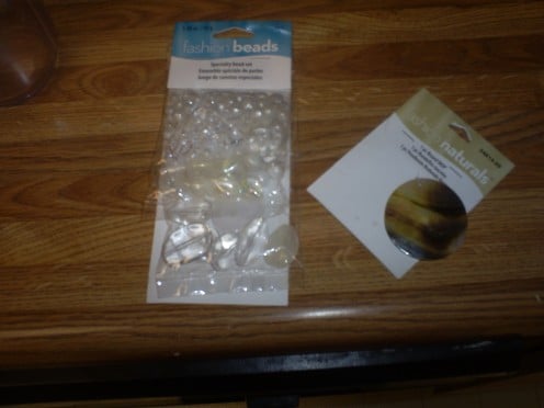 Here I have gathered the shell and white acrylic beads I will be using for this project.