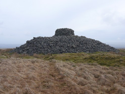 Here's a burial barrow. Note the lack of wheels. From Wikimedia Commons user Herbthyme.