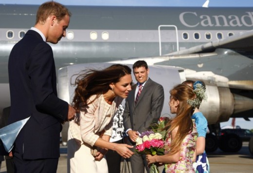 Flowers for the Duchess as the pair arrive at the airport in Charlottetown