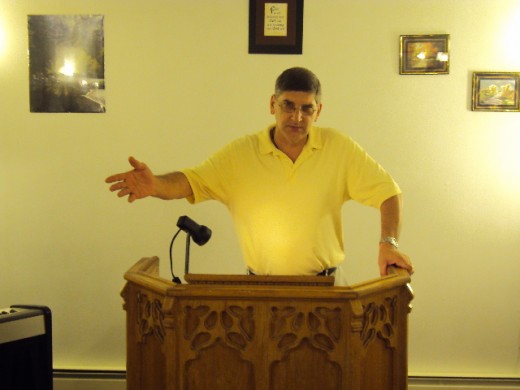 Evangelist Michael preaching in The Great American Fast
