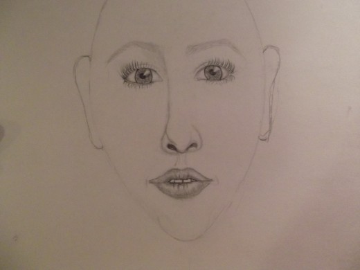 Evaluate the face and make changes as needed.  This face needs a fuller jaw and less pointed chin..