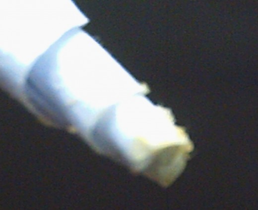 After 30 seconds, some ear wax was deposited at the tip of the cone. (Photo by Travel Man)