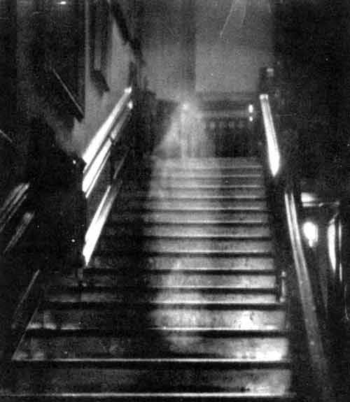Most famous spirit photo of all time--The Brown Lady descending the stairs at Raynham Hall, Norfolk, England