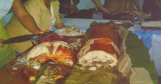 Chopping the Lechon or roasted pig (Photo by Travel Man)