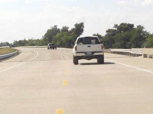 He is driving a borrowed SUV pulling a trailer, with Stepdad driving his truck and lagging behind it all is Mom driving his car loaded with bedding. 