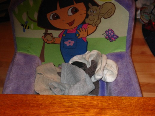 Dora keeps an eye on the socks