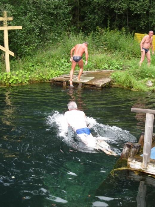 Me beginning my swim across the frigid spring in the vicinity of the Valday District of the Novgorod Oblast, Russia.