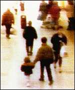 James Bulger being led away. CCTV footage that helped convict Robert Thomson and Jon Venables