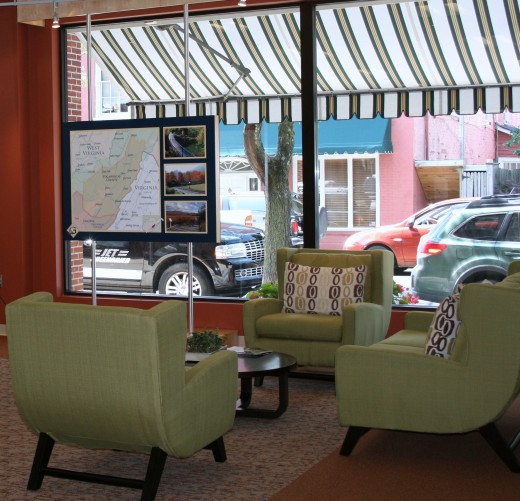 The Greenbrier Valley Visitors Center, located in downtown Lewisburg, has several seating area, a bank of computers, interactive displays, a wall of brochures, public restrooms & a help desk.