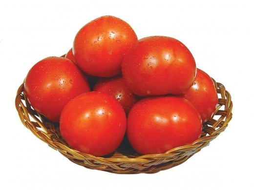 A basket of beautiful, bright red, late summer tomatoes is the base for sweet and tangy tomato soup. Photo by Rissmu at sxc.hu.