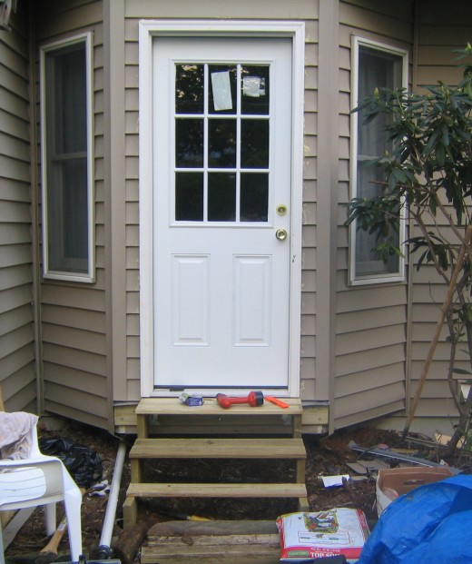 Fig 7.  Completed project.  The foot steps are temporary.  You can add a better walkway, porch or deck.