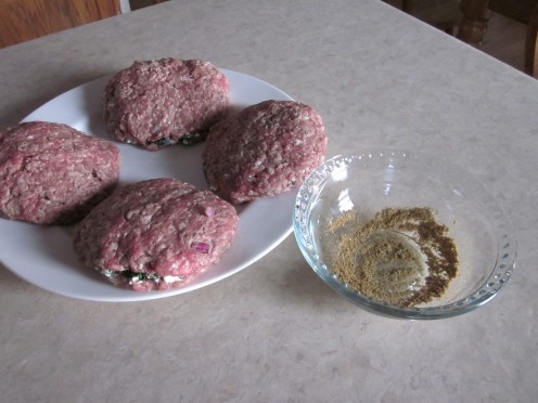 Spinkle top of patties with combined Cayenne and Cumin. 